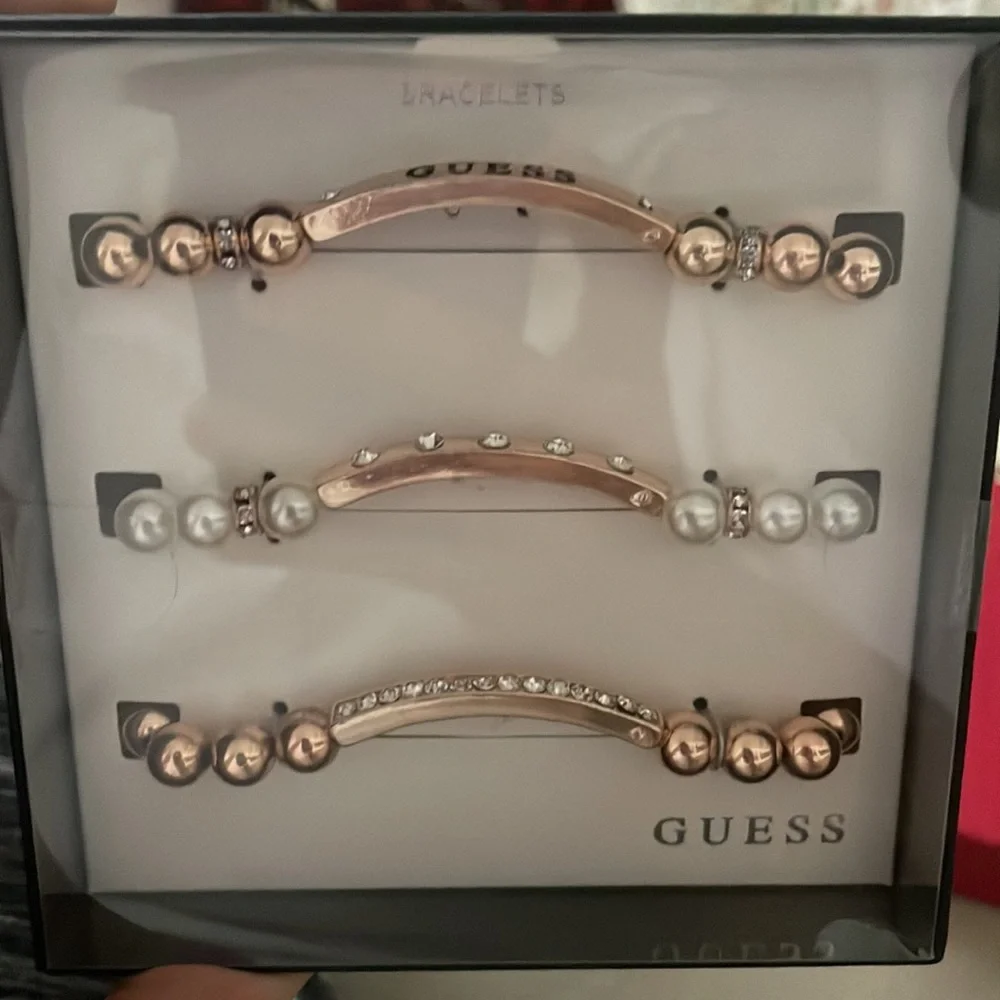 Guess new set of three bracelets with pearls and‎ stones